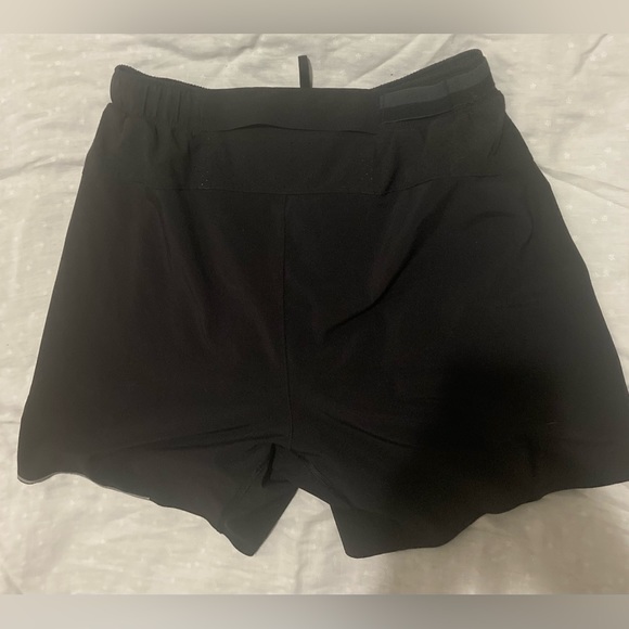 men’s Medium Lululemon sized black shorts. - Picture 2 of 2